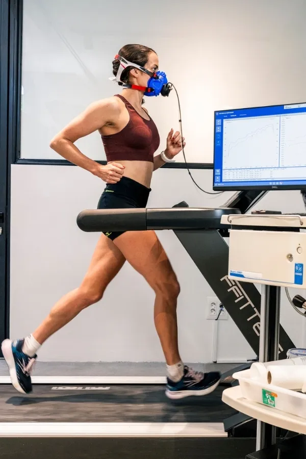 Athlete running on a treadmill during a metabolic test